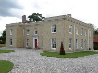 Full architectural design of manor in Essex with classic white bricking